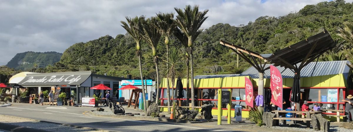 Restaurants and stores across the street from the Pancake Rocks trailhead