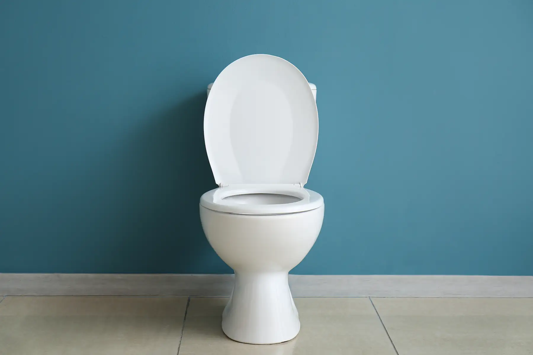 Toilet with blue background